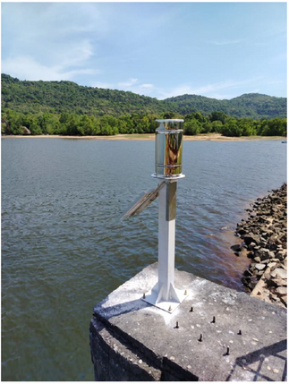 Rain gauge installation on a bridge